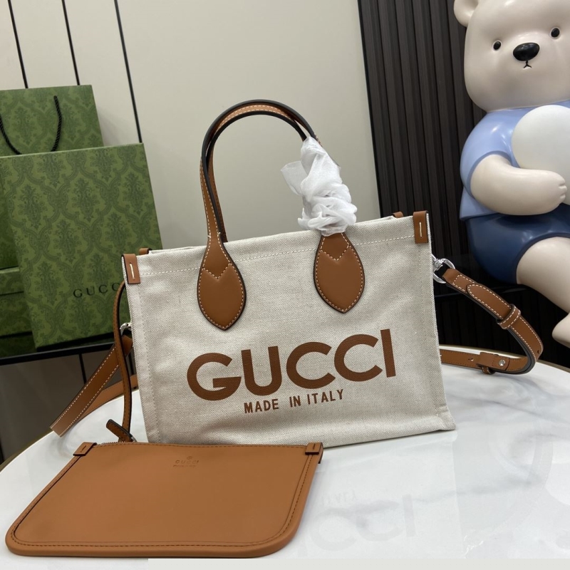 G*u*i shopping bags
